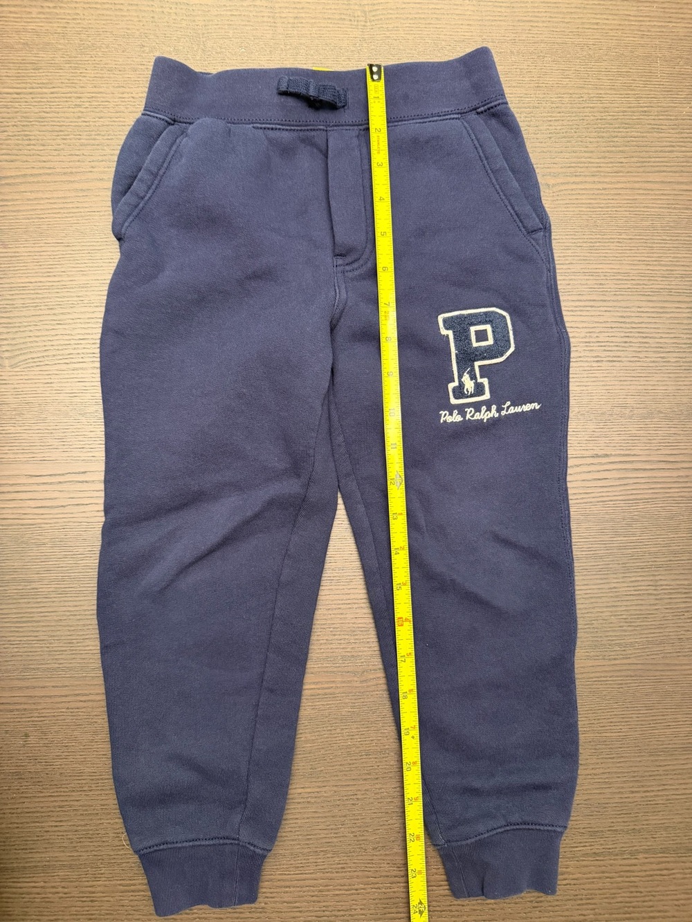 Boys Polo Ralph Lauren navy joggers in size 6
